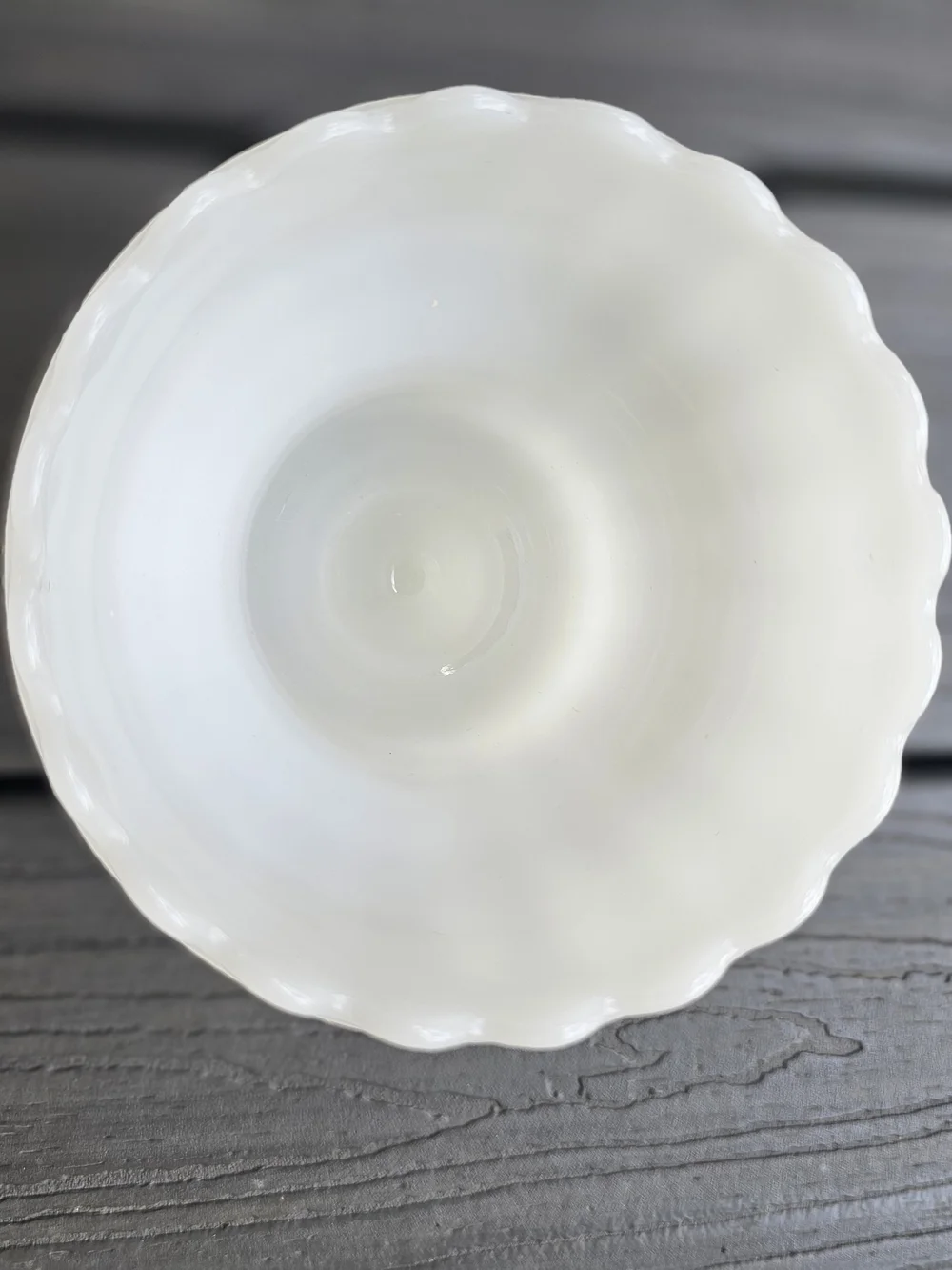 Vintage E.O. Brody white milk glass footed urn planter featuring a fluted body